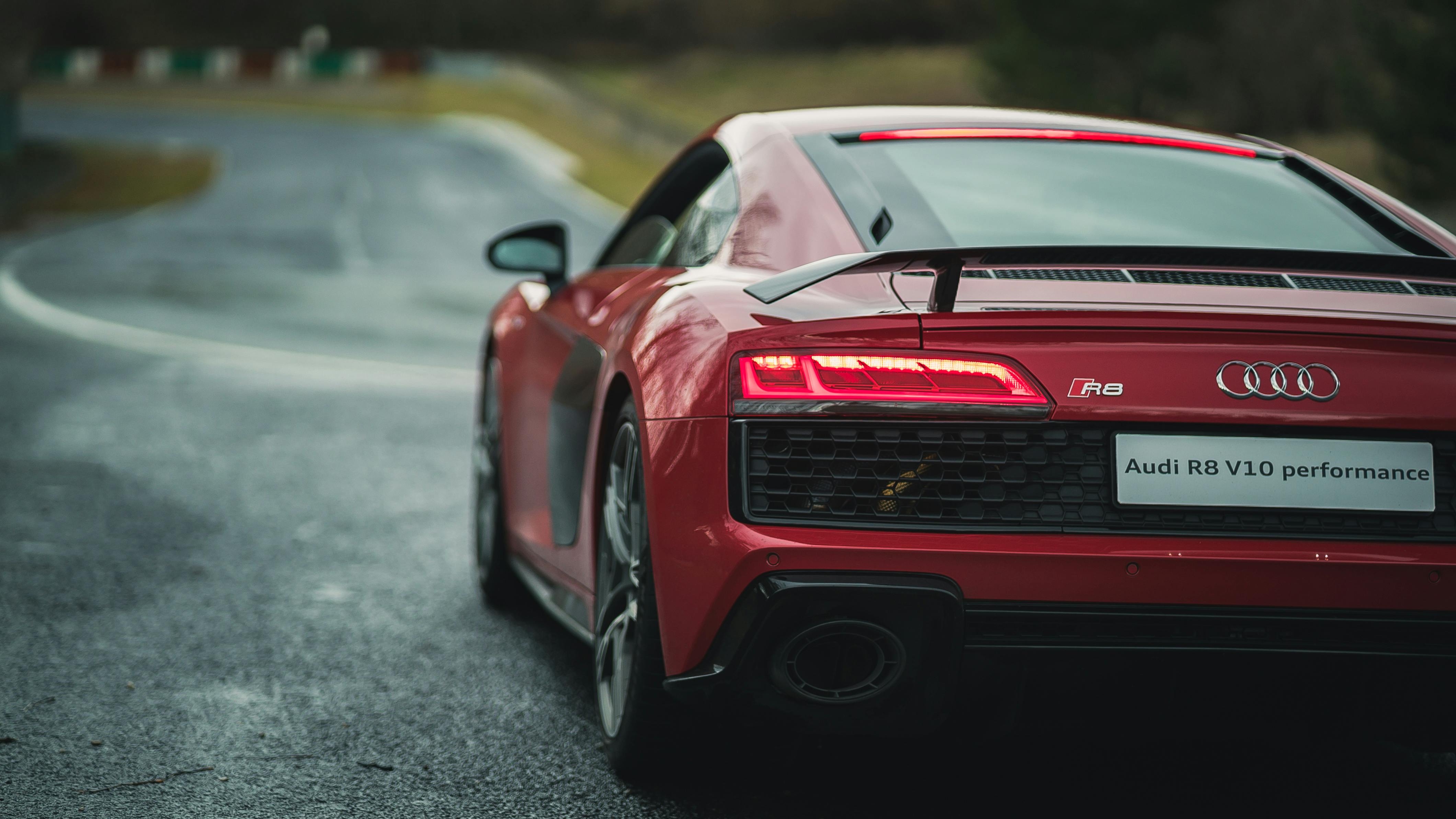 Audi R8 sports car parked in a scenic location